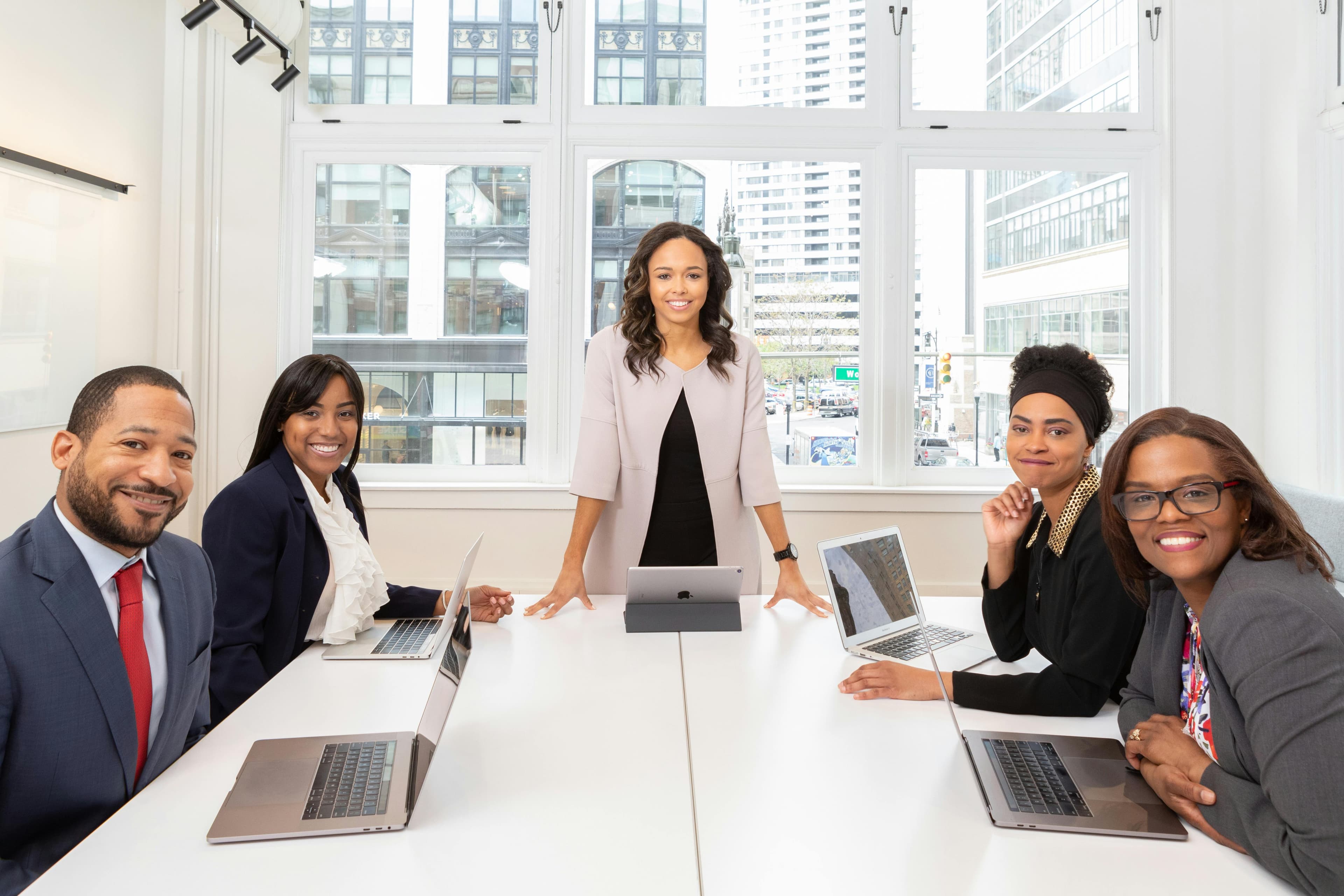 Business team reviewing compliance strategy in a modern office